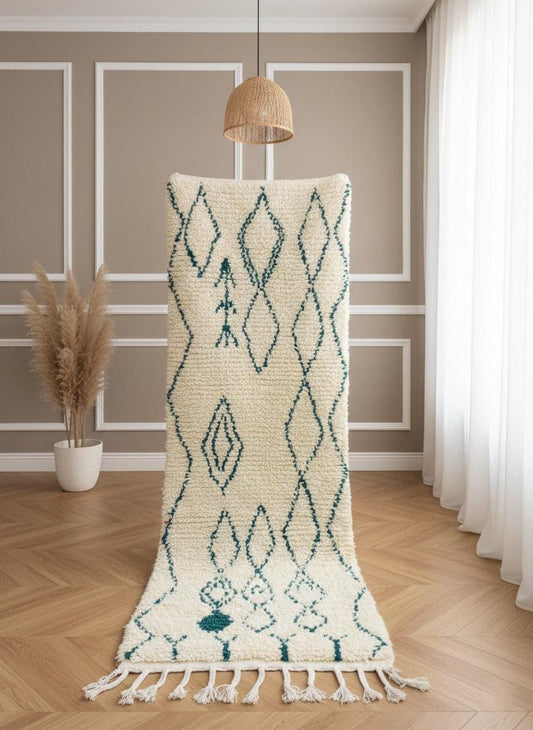 Ivory Moroccan hallway rug with teal geometric motifs and tassels