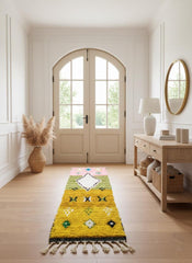 Yellow Moroccan wool runner with geometric motifs displayed upright