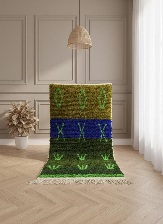 Vertical view of handmade Moroccan rug with green symbols