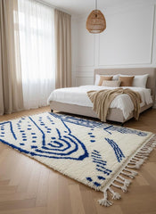 Blue and white Berber rug in modern bedroom