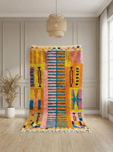 Handmade Moroccan Berber rug with colorful tribal geometric design
