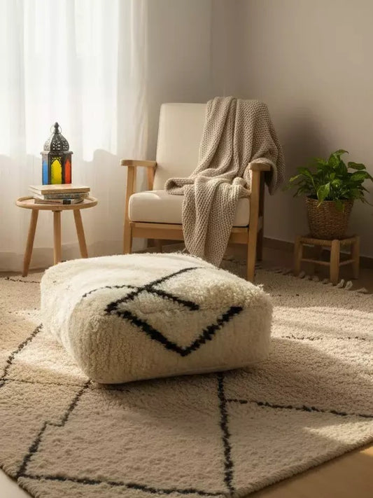 Handmade Moroccan Asru floor pouf in neutral interior