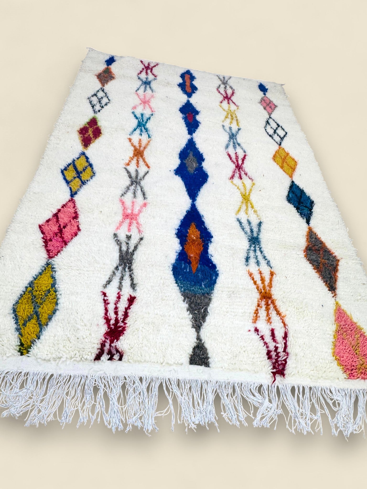 Handwoven Massinissa wool rug with boho Berber design