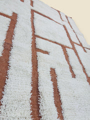 Tafenzut Berber carpet detail showing natural wool weave and artisan texture