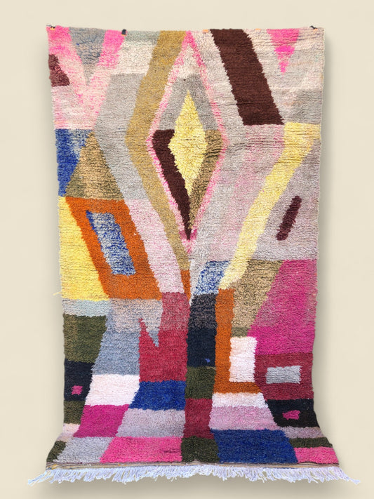 Full view of Tassadit Moroccan rug with bold tribal color-block design