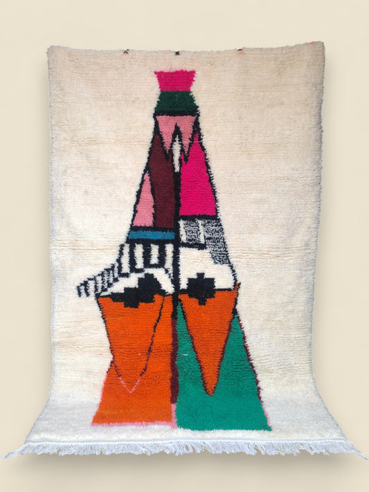 Full view of large Tazghart Moroccan rug with bold geometric design and bright palette