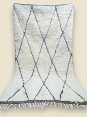 Tihya Moroccan Berber rug hung to show full diamond design