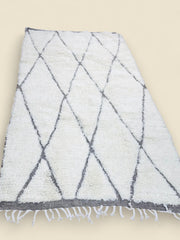 Handmade Tihya Berber rug with grey diamond pattern on cream wool