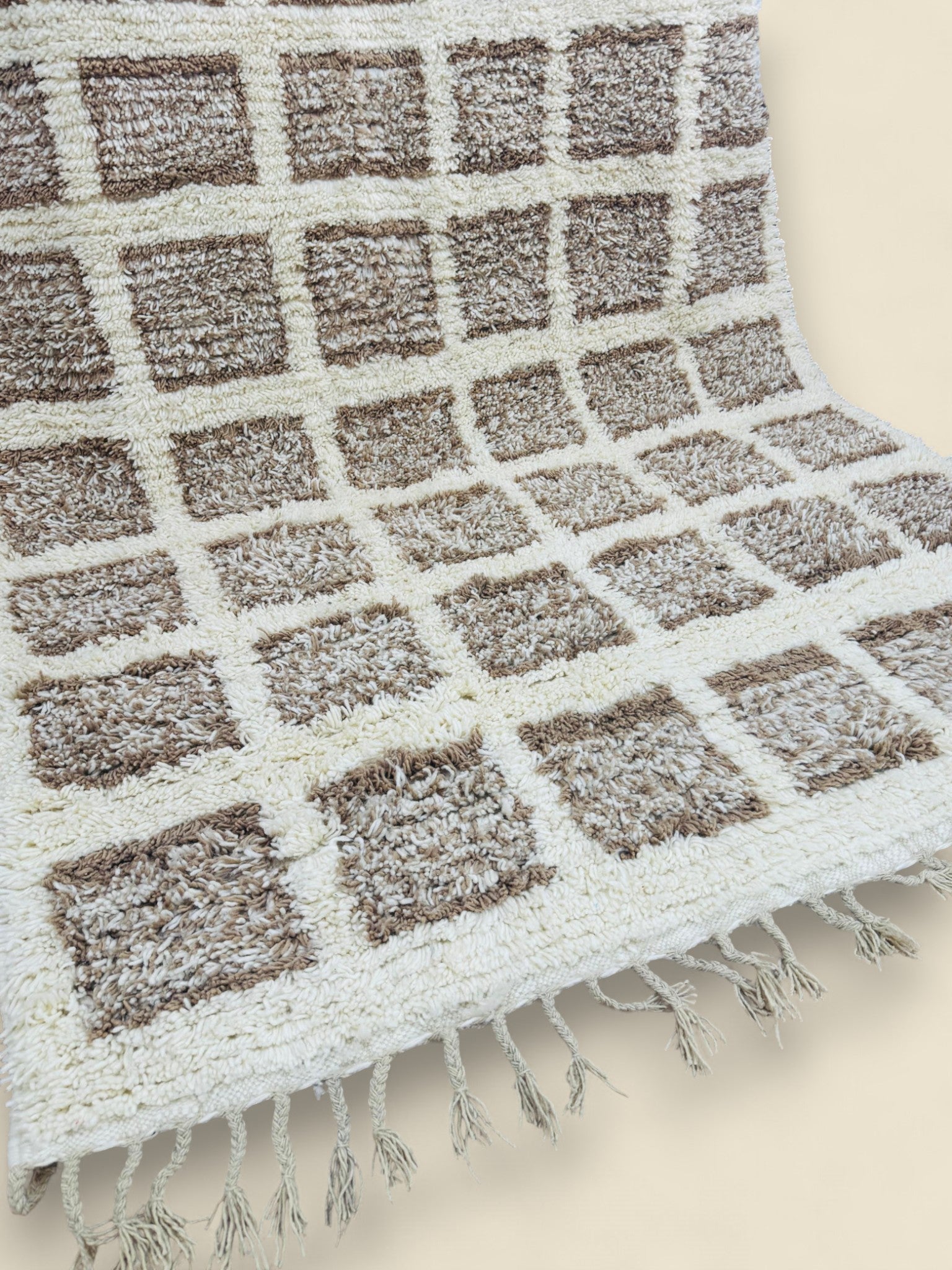 Folded Tilila Berber rug displaying backside weaving details