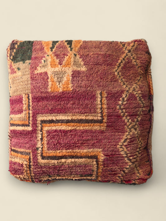 Top view of the Tizwit pouffe showing tribal geometric motifs