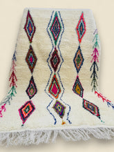 Moroccan Tura Rug showcasing bold tribal patterns and soft wool texture