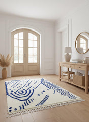 Handmade Moroccan wool Berber rug by fireplace