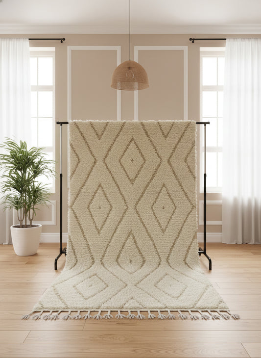 Front view of Tuda rug showing textured diamond motifs and fringe detail