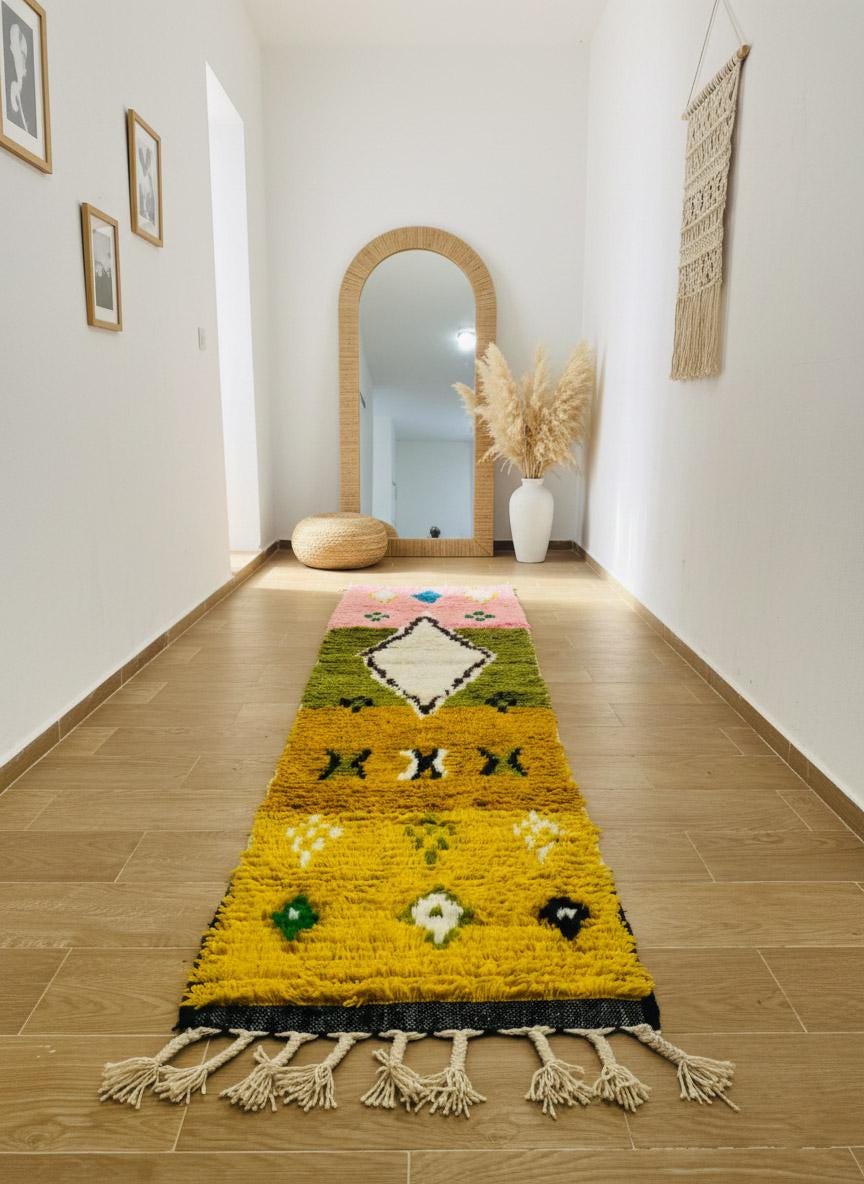 Moroccan yellow runner rug styled beside sofa