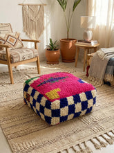 Handmade Moroccan pouf in modern living room setting