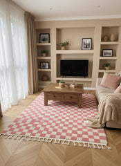 Pink checkered Moroccan rug styled in living room