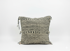 Front view of Tisra black and white Berber pillow handwoven in Moroccan wool