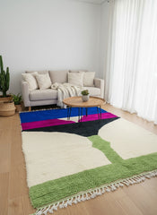 Tissam Moroccan rug styled in a modern living room with sofa and wooden table