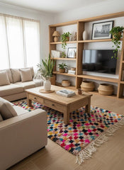 Pink Moroccan rug with colorful pattern in living room