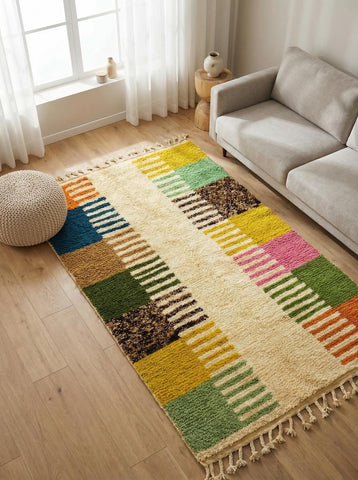 Handmade Berber rug with vibrant blocks in minimalist interior