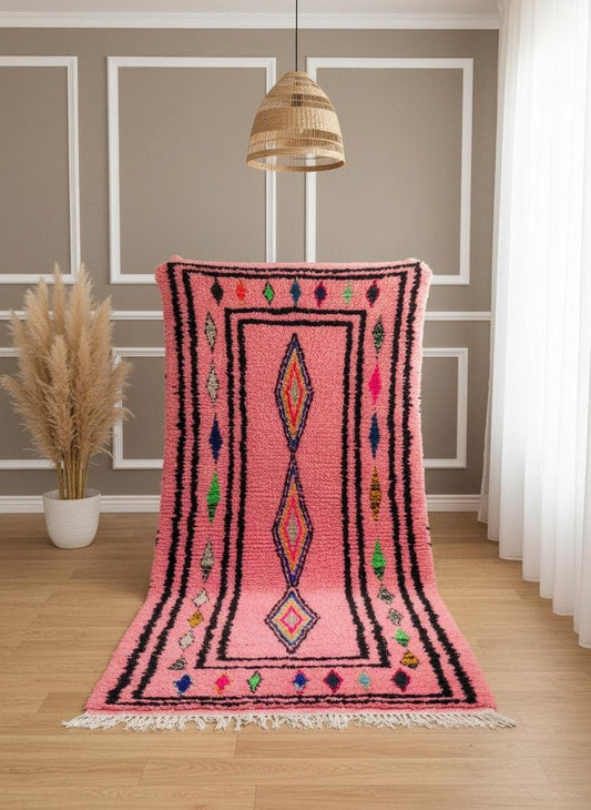 Boho pink Moroccan rug with multicolor diamond motif
