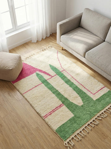 Modern Moroccan cactus rug styled in living room with fireplace and neutral furniture