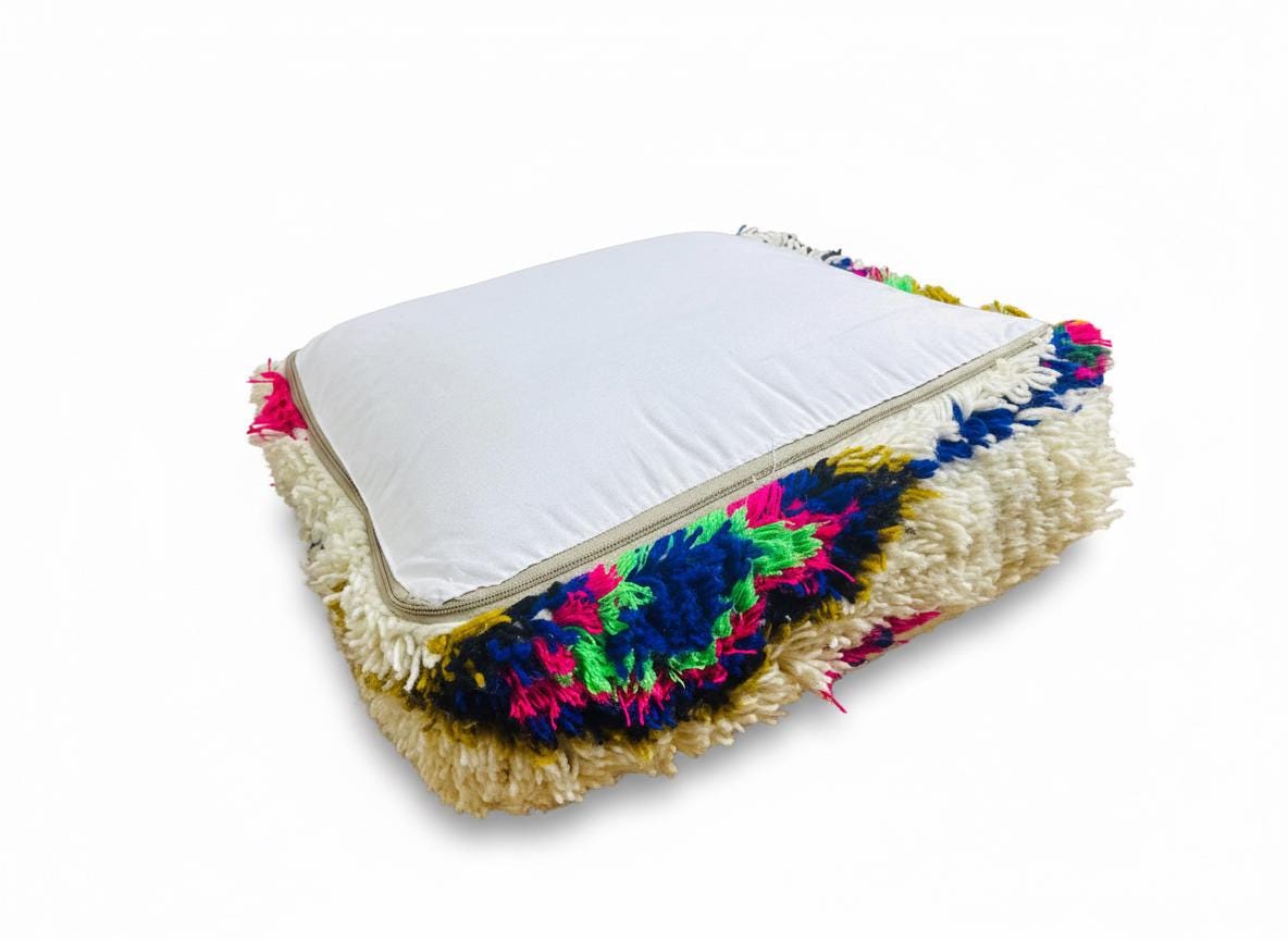 Handwoven Berber pouf as floor cushion accent