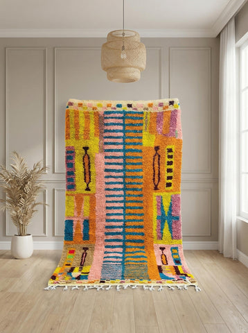 Handmade Moroccan Berber rug with colorful tribal geometric design