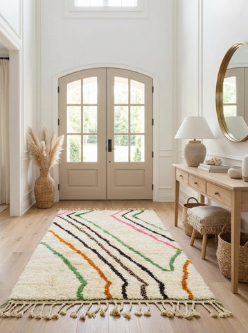 Cream wool Moroccan rug with colorful lines in bright entryway
