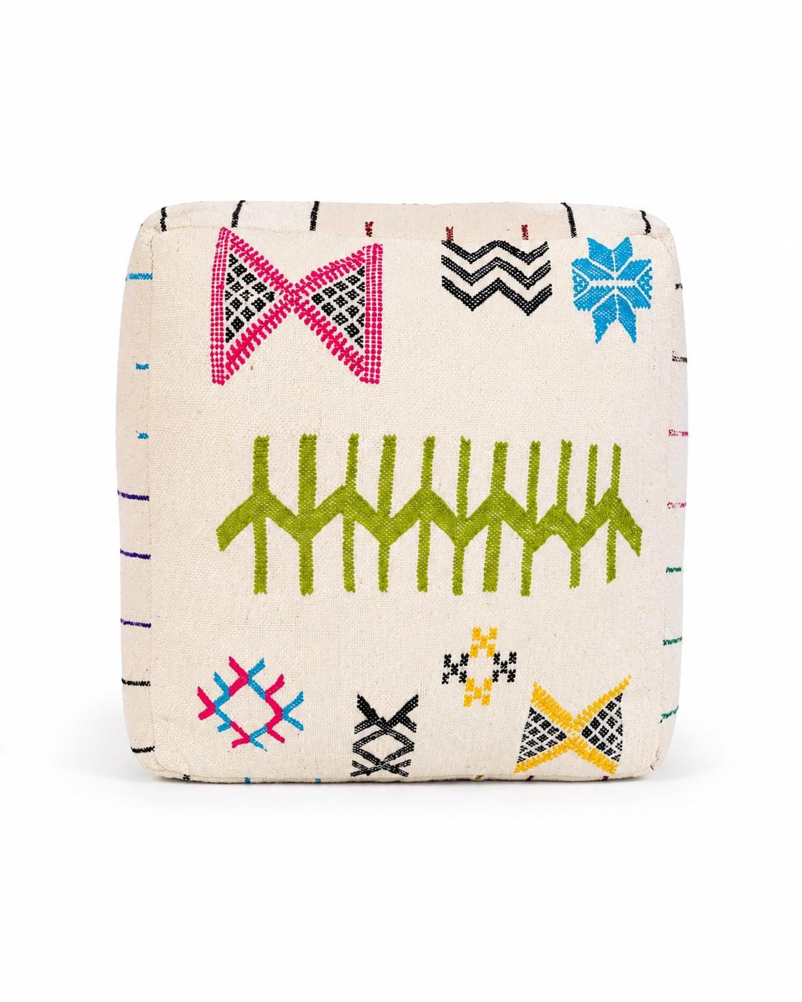 Colorful embroidered Moroccan Berber pouf on a clean white background.