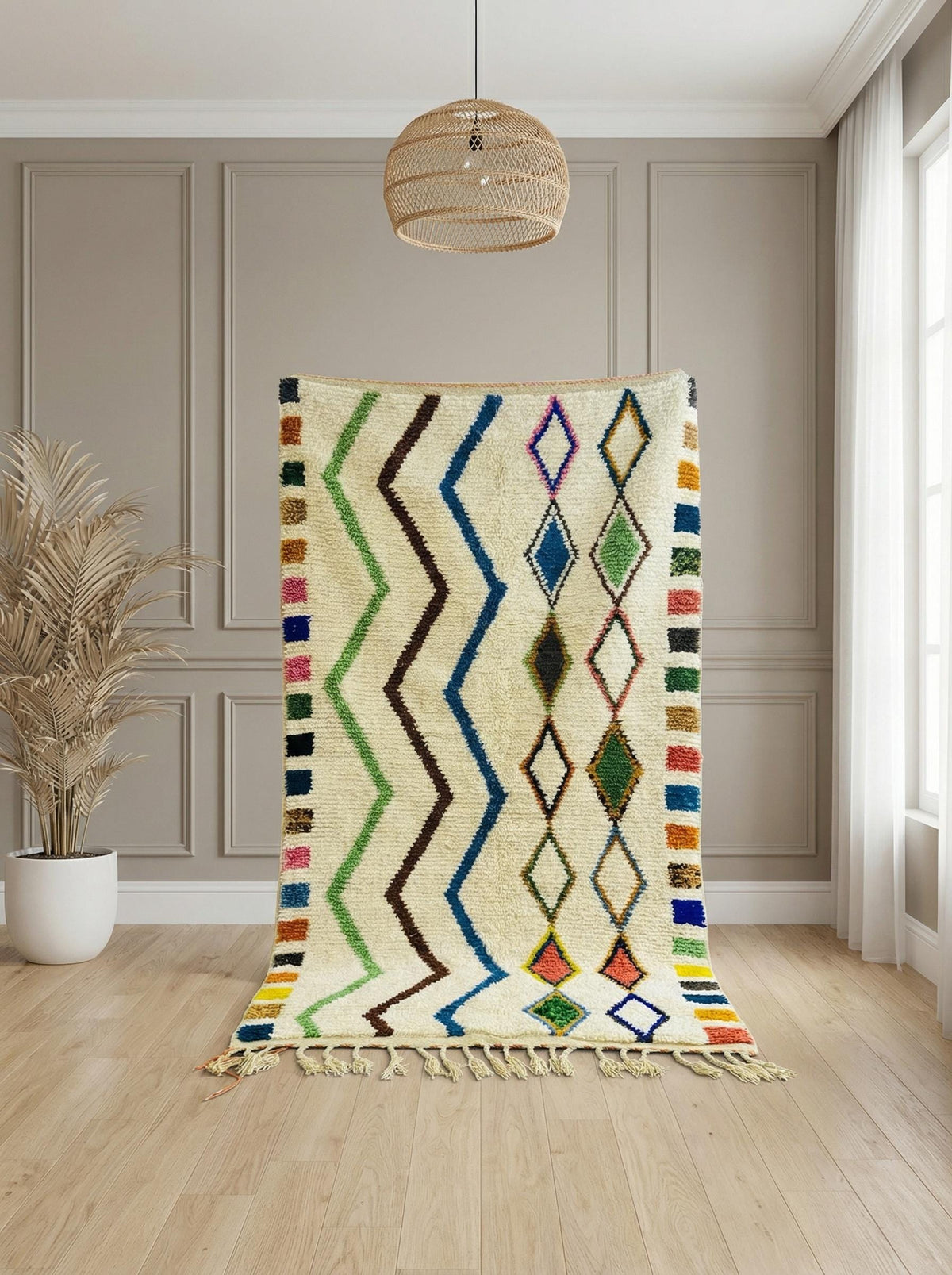 Handwoven Moroccan rug displayed vertically with fringe