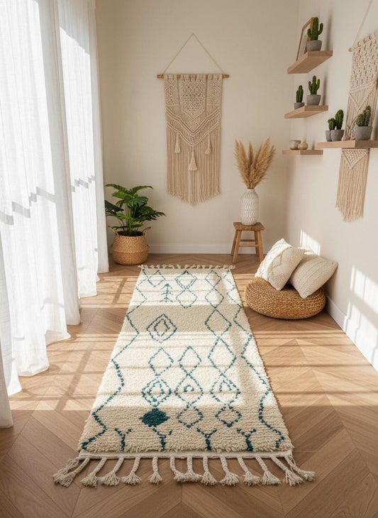 Cream Moroccan runner rug with teal diamond pattern in bright hallway