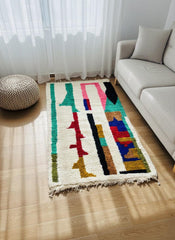 Handmade abstract Berber rug styled near sofa