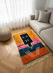 Bold abstract Berber rug styled by fireplace