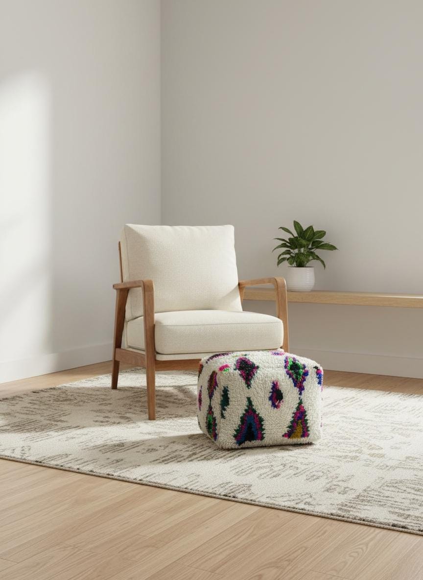 Colorful Moroccan Berber wool pouf in modern interior