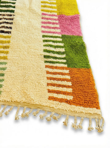 Close-up of handmade Moroccan rug texture with multicolor design