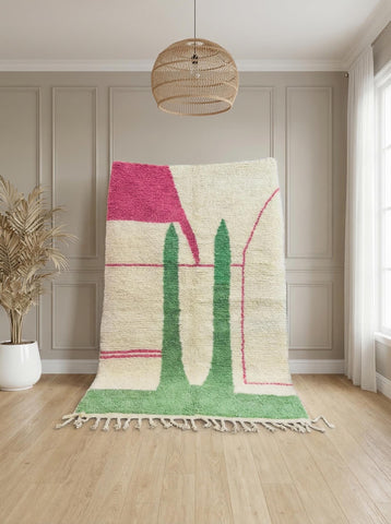 Moroccan Berber cactus rug displayed vertically showing handwoven wool texture and fringe