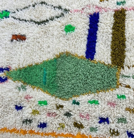 Close-up of handmade Moroccan Berber rug with colorful abstract motif