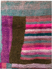 Detail of Berber striped patterns in pink, purple, and brown on Tazult Rug