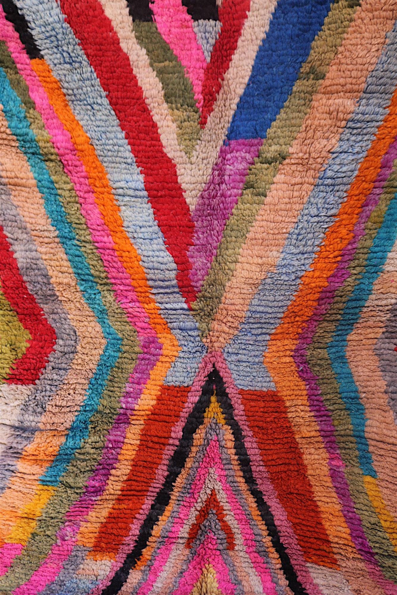 Colorful Anir Berber rug with bold chevron stripes in multicolor tones