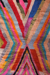 Colorful Anir Berber rug with bold chevron stripes in multicolor tones