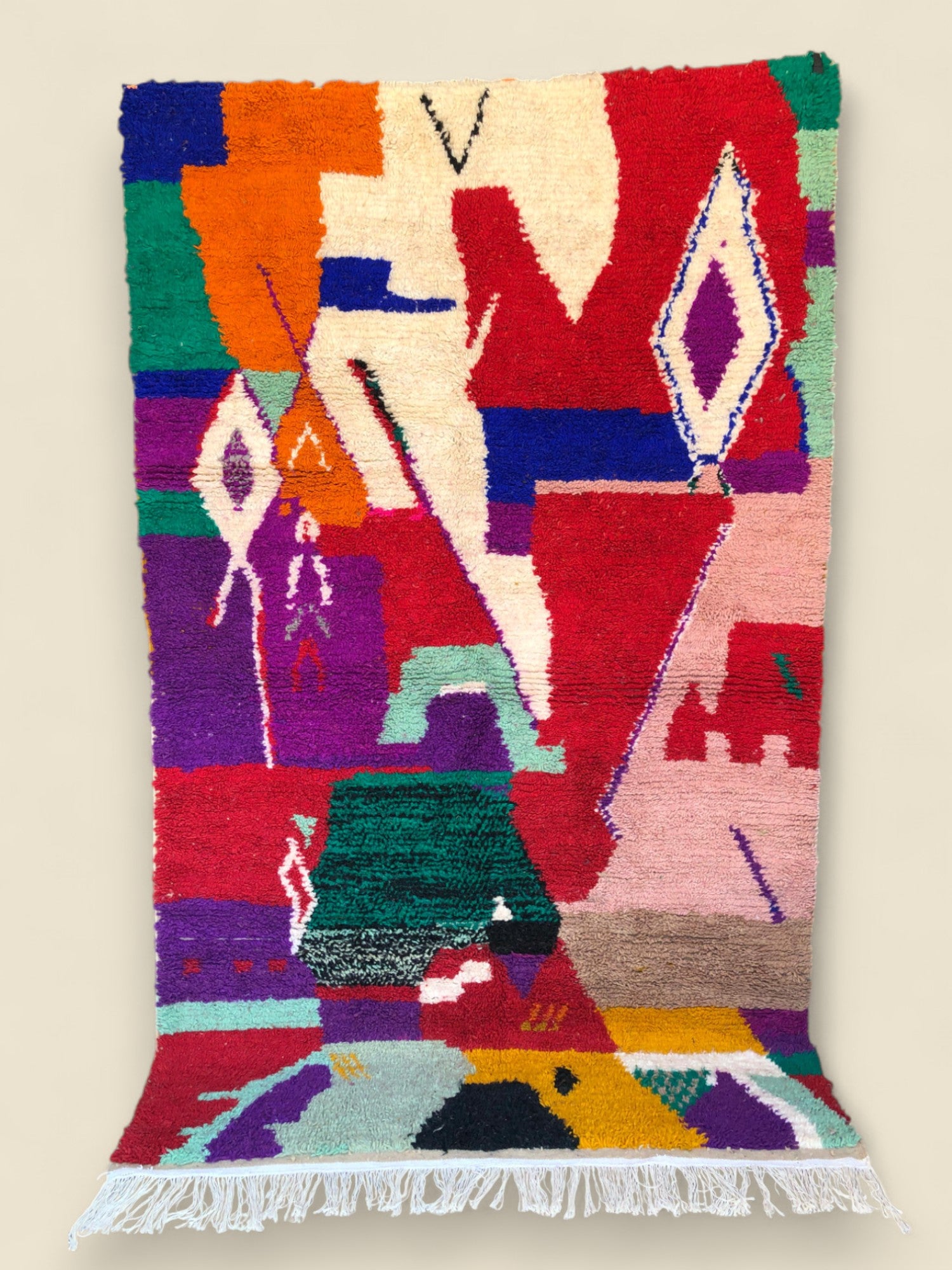 Full view of Asalas Moroccan rug with bold geometric shapes and bright colors