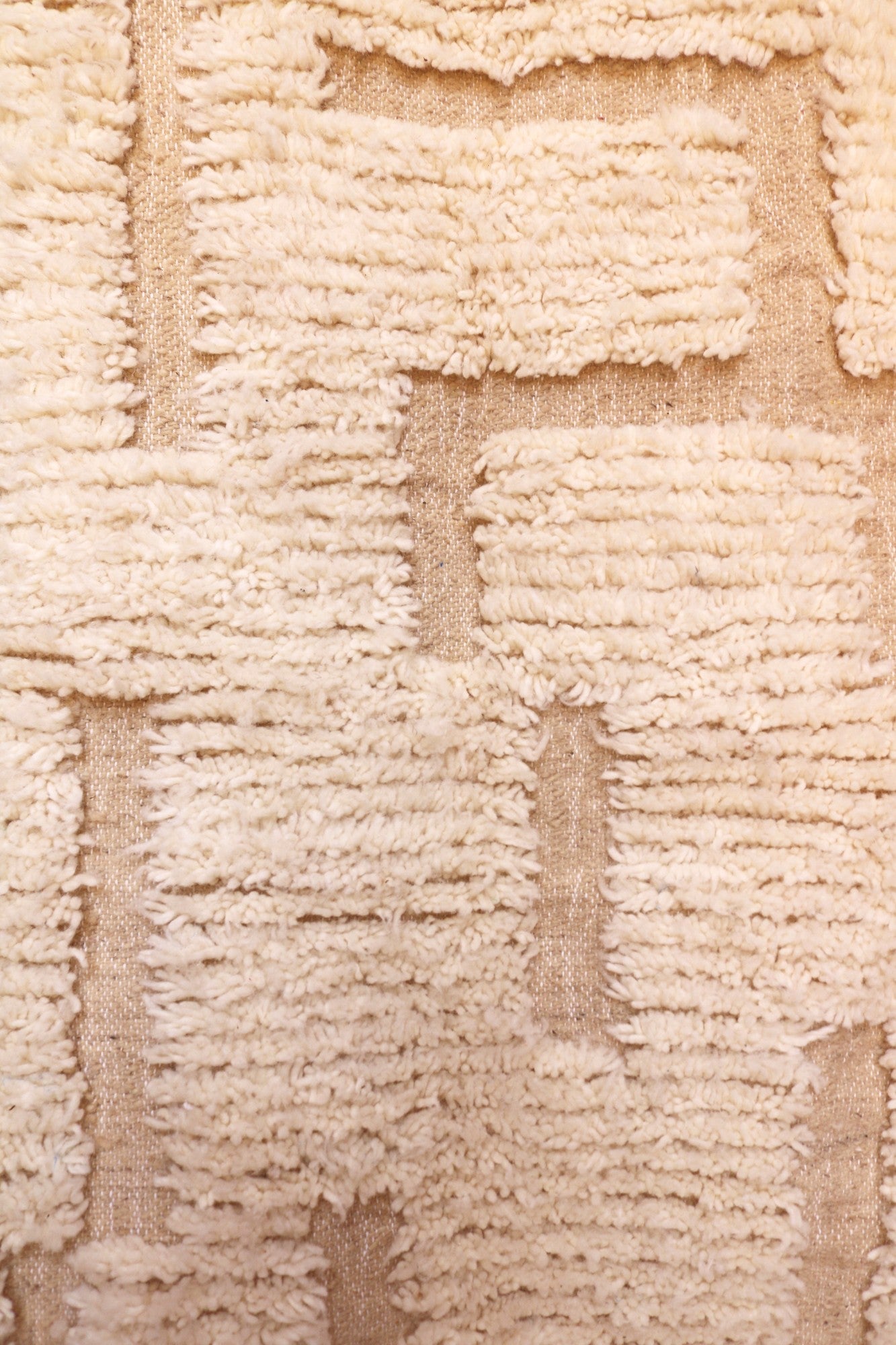 Detailed texture of high-low ivory wool pile on Ayla Moroccan rug