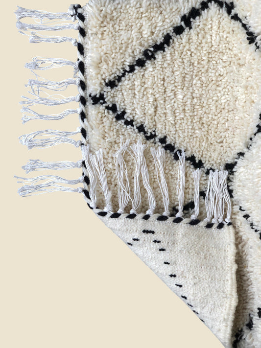 the back of Aicha Moroccan Rug