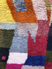 Colorful wool Moroccan rug with abstract geometric shapes and thick pile