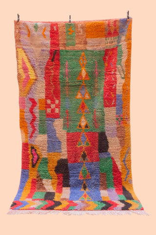 Colorful geometric-patterned rug on a beige background