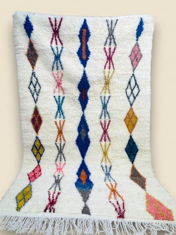 Moroccan Massinissa rug featuring vibrant geometric motifs