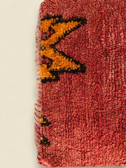 Handmade Berber pouffe in red wool and orange 