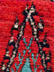 Close-up of handcrafted Berber pouffe with thick wool pile