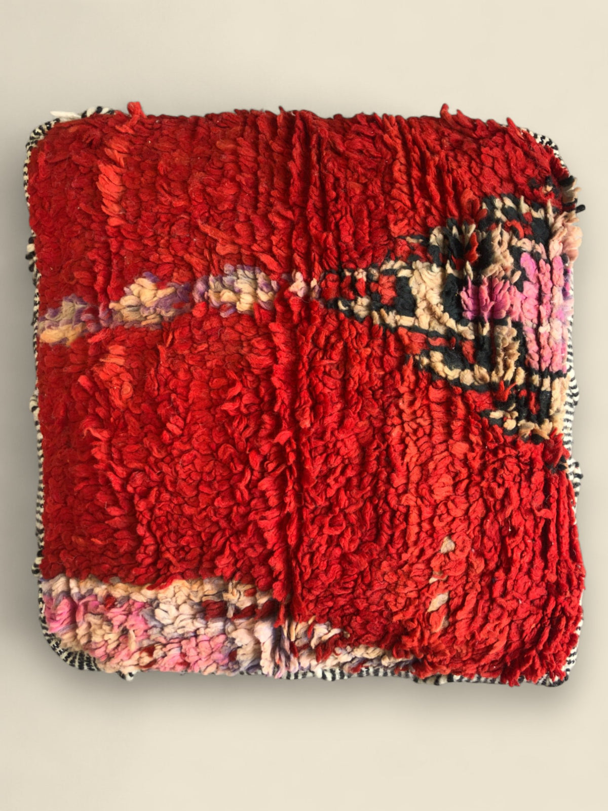 Top view of Moroccan Pouffe With red Color Wool 